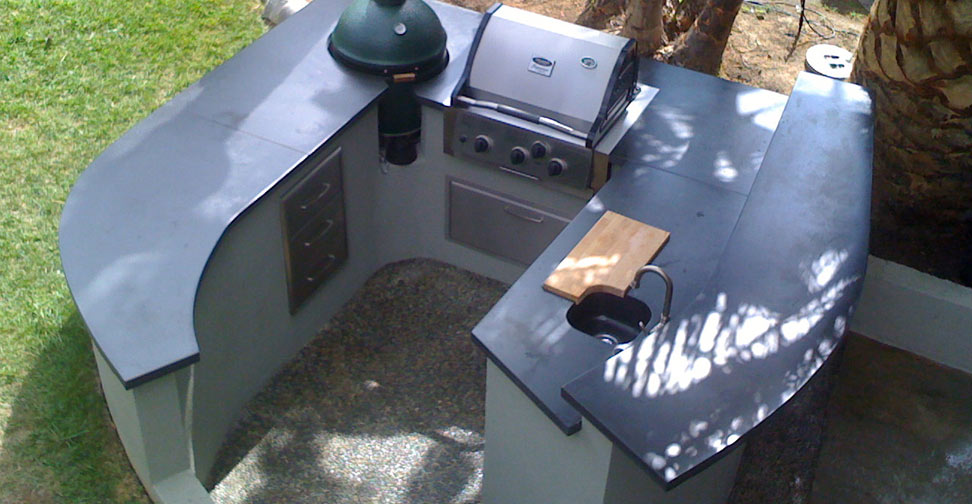 Outdoor Concrete Kitchen Countertop and Barbecue Surround by Chris Frazer | Concrete Exchange