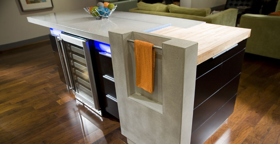 Reaching Quiet Designs Concrete Kitchen Island with Under-the-Counter Lighting