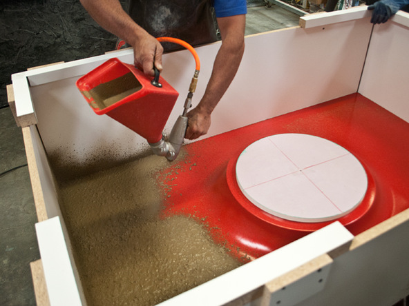 Spraying and Backing Step 2.2 - Fabric Formed Concrete Fire Table | CHENG Concrete Exchange