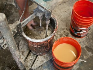 Spraying and Backing Step 3.1 - Fabric Formed Concrete Fire Table | CHENG Concrete Exchange