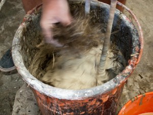 Spraying and Backing Step 3.2 - Fabric Formed Concrete Fire Table | CHENG Concrete Exchange