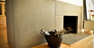 Wrap-Around Concrete Fireplace Surround and Hearth by Yves St. Hilaire | Concrete Exchange