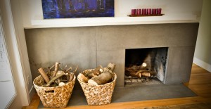 Wrap-Around Concrete Fireplace Surround and Hearth by Yves St. Hilaire | Concrete Exchange
