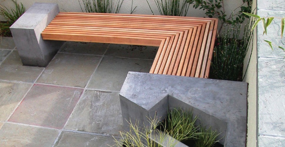 Concrete and wood bench with water feature | CHENG Concrete Exchange