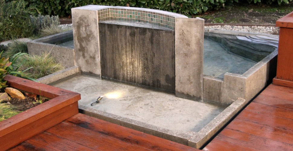 Concrete wall with water feature by The Ranch Design Group, Darron Endo |CHENG Concrete Exchange