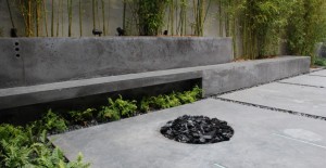 Outdoor concrete living area with concrete firepit | CHENG Concrete Exchange
