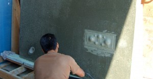 Polishing the Surface of the California Academy of Sciences Donor Wall Designed and Created by Fu-Tung Cheng | Concrete Exchange