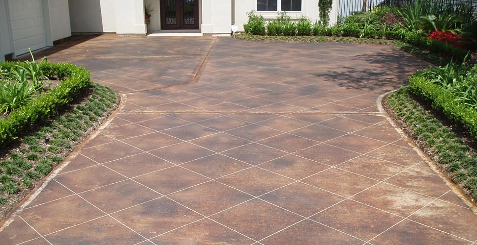Stained Driveway - Stamped Artistry | Concrete Exchange