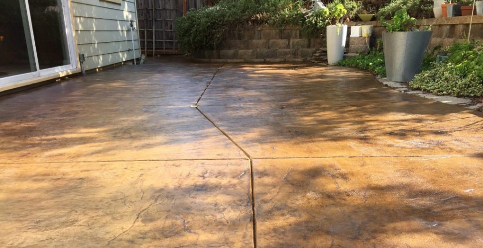 Refinished concrete patio using Surecrete sealer and stain